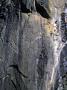 Climber Perched On Large Rock Wall, Madagascar by Michael Brown Limited Edition Print