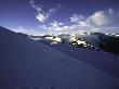 Sun Shines On Snowy Mountain Rocks, New Zealand by Michael Brown Limited Edition Print