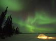 Igloo Lit Up At Night Under Northern Lights Northwest Territories, Canada March 2007 by Eric Baccega Limited Edition Print