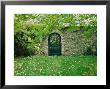 Ornamental Gate In Stone Wall In Shade Under Tree, View Through Gateway, Somerset by Mark Bolton Limited Edition Print