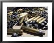 Spent Brass And Disintegrated Links by Stocktrek Images Limited Edition Print