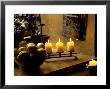 Still Life With Lighted Candles And Bowl Of Lemons In Coffee Shop, Tallinn, Estonia by Nancy & Steve Ross Limited Edition Print