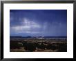 Rain Pores Down On The Desert Landscape In New Mexico by Stacy Gold Limited Edition Print