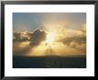 Sun Beams Through The Clouds Onto The Ocean At Big Sur by Rich Reid Limited Edition Print