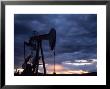 Oil Rig Silhouetted At Sunset, Adobe Town, Wyoming by Joel Sartore Limited Edition Pricing Art Print