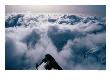 Climber Ascending Ridge Above Cloud, Westland National Park, New Zealand by Grant Dixon Limited Edition Print