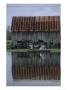 A Family Travels By Rowboat Through Flood Waters After Heavy Rains by Joel Sartore Limited Edition Pricing Art Print