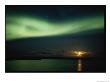 Auroral Curtain Over Water At Sunset by Norbert Rosing Limited Edition Print
