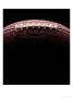 Close-Up Of Football Against Black Background by Rick Kooker Limited Edition Pricing Art Print