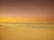 Sunset On Cable Beach, Nassau, Bahamas by Geoff George Limited Edition Print