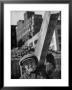 Construction Worker Carrying A Piece Of Wood by Cornell Capa Limited Edition Print