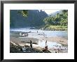 Villagers On Banks Of Nam Tha River, A Tributary Of The Mekong, South Of Luang Nam Tha, Indochina by Richard Ashworth Limited Edition Print