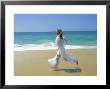 Woman Running Along Beach, Kovalam, Kerala State, India by Gavin Hellier Limited Edition Print