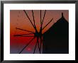 Silhouette Of Windmill At Sunset, Oia, Santorini (Thira), Cyclades Islands, Greece by Marco Simoni Limited Edition Print