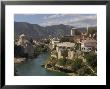 The New Old Bridge Over The Fast Flowing River Neretva, Mostar, Bosnia, Bosnia-Herzegovina, Europe by Graham Lawrence Limited Edition Print