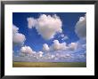 Cumulus Clouds Boiling Over A Saskatchewan Prairie In Summer by John Eastcott & Yva Momatiuk Limited Edition Print