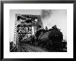Long String Of Tank Cars Rumbling Across The 4 1/2 Mile Huey Long Bridge At New Orleans by Peter Stackpole Limited Edition Print