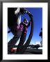 Airman Fuels An Aircraft Prior To Launch Aboard Aircraft Carrier Uss John C Stennis by Stocktrek Images Limited Edition Print