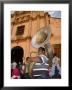 Tuba Player In Front Of Iglesia San Juan Bautista De Subtiava During Semana Santa, Leon, Nicaragua by Margie Politzer Limited Edition Print