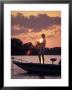 Man Fishes During Sunset On The James River Near Shirley Plantation In Virginia by Richard Nowitz Limited Edition Print