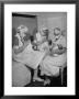 Special Nursery Nurses Wearing Masks As They Bottle-Feed Fully Developed Premature Babies by Hansel Mieth Limited Edition Pricing Art Print