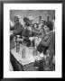 Pouring Olive Oil In Buyers' Bottles In Black Market by Alfred Eisenstaedt Limited Edition Print
