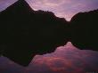 Mountain Silhouettes Reflected In Moresby Lake At Twilight by Stephen Sharnoff Limited Edition Print