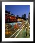 Bourbon Street And City Skyline At Night, New Orleans, Louisiana, Usa by Gavin Hellier Limited Edition Print