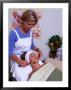 Woman Receiving Facial Treatment At Health Spa, Napa Valley, California, Usa by Roberto Gerometta Limited Edition Print