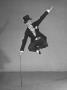 Dancer Fred Astaire Vaulting Off His Cane As He Does A Climatic Jump In Puttin' On The Ritz by Bob Landry Limited Edition Print