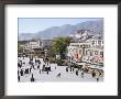 Main Square In Front Of Jokhang, Potala Palace Beyond, Lhasa, Tibet, China by Tony Waltham Limited Edition Print