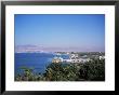 View Over Red Sea Resort Marina And Beach Hotels Towards Israeli Town Of Eilat, Aqaba, Jordan by Christopher Rennie Limited Edition Pricing Art Print