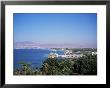 View Over Red Sea Resort Marina And Beach Hotels Towards Israeli Town Of Eilat, Aqaba, Jordan by Christopher Rennie Limited Edition Print