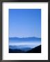 Mountainside At Sunrise by Fogstock Llc Limited Edition Print