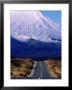 Road Leading Up To Snow-Covered Mount Ngauruhoe, Tongariro National Park, New Zealand by Oliver Strewe Limited Edition Pricing Art Print