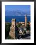 Buildings With Harbour In Background, Antalya, Turkey by Izzet Keribar Limited Edition Print