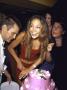Actress Singer Jennifer Lopez Cutting Cake At Her 29Th Birthday Party by Marion Curtis Limited Edition Print