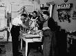 Czech Pro-Nazi Family Making String Of Swastika Pennants To Welcome Hitler's Occupying Troops by John Phillips Limited Edition Print