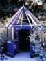 Purple Gazebo In The Nichols Garden At 69, Albert Road, Reading, Covered With Snow by Clive Nichols Limited Edition Print