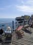 Deckchairs On Brighton Pier, Brighton, Sussex, England by Natalie Tepper Limited Edition Print