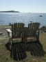 Two Adirondack Chairs Looking At View At Cedar Key, Florida by Natalie Tepper Limited Edition Print