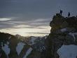 A Group Of Climbers Silhouetted Atop A Rocky Promontory by George F. Mobley Limited Edition Pricing Art Print