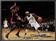 Miami Heat V Washington Wizards: Andray Blatche And Chris Bosh by Ned Dishman Limited Edition Print