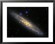 The Sculptor Galaxy, Ngc 253 In The Constellation Sculptor by Stocktrek Images Limited Edition Pricing Art Print