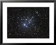 Ngc 457 Is An Open Star Cluster In The Constellation Cassiopeia by Stocktrek Images Limited Edition Print