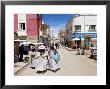 Women Walking Down Street, Copacabana, Laketiticaca, Bolivia, South America by Marco Simoni Limited Edition Print