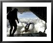 Pararescuemen Jump Out The Back Of A C-130 Hercules by Stocktrek Images Limited Edition Pricing Art Print
