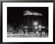 Night City View With Neon Signs Of The New Fiat 500 Located On The Roof Of A Building by A. Villani Limited Edition Pricing Art Print