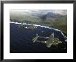 Excellent Of A Squadron Of American P-38 Fighters In Flight Over An Aleutian Island by Dmitri Kessel Limited Edition Print