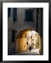 Person And Archway, Panzano, Chianti Region, Tuscany, Italy by Janis Miglavs Limited Edition Print